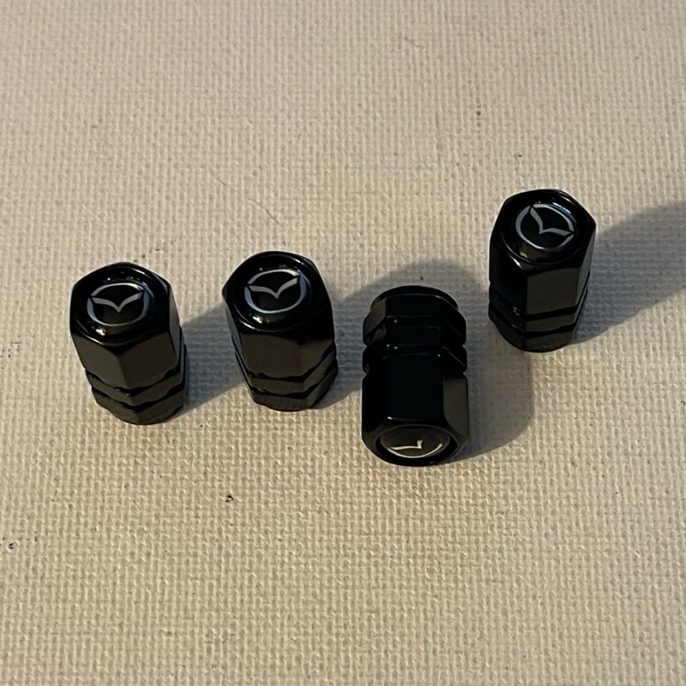 Mazda valve Stem caps in Black set of 4 NWT